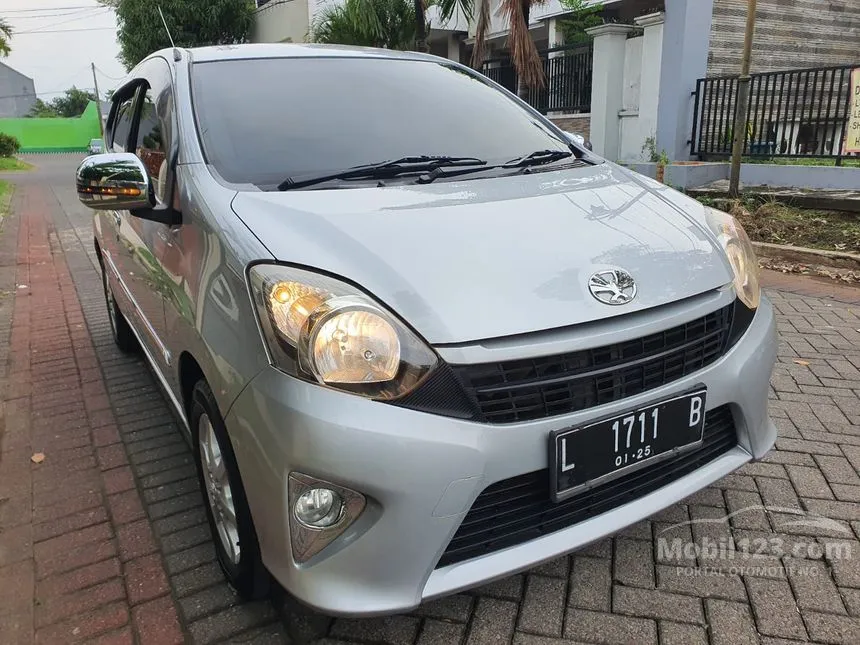 Jual Mobil Toyota Agya 2015 G 1.0 di Jawa Timur Manual Hatchback Silver Rp 98.000.000