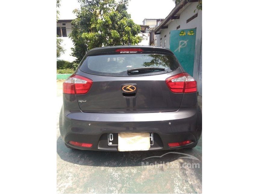 Jual Mobil KIA Rio 2012 UB 1.4 di Jawa Barat Manual Hatchback Abu-abu