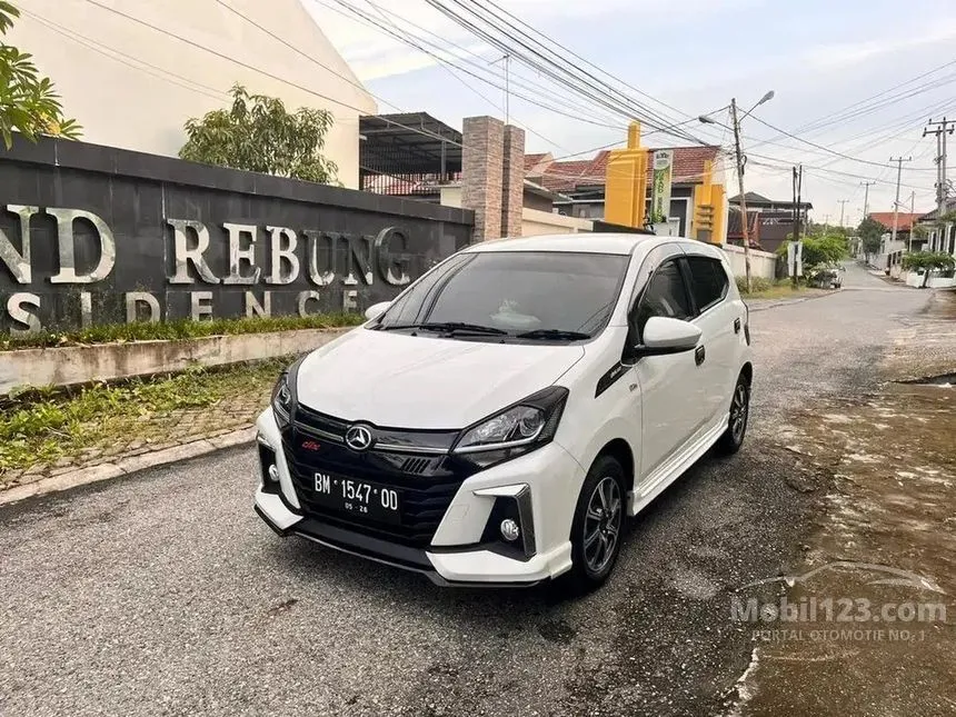 Jual Mobil Daihatsu Ayla 2021 R Deluxe 1.2 di Riau Manual Hatchback Putih Rp 136.000.000