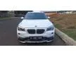 Jual Mobil BMW X1 2014 sDrive18i Business 2.0 di Banten Automatic SUV Putih Rp 255.000.000