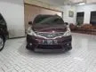Jual Mobil Nissan Grand Livina 2013 Highway Star Autech 1.5 di Jawa Timur Automatic MPV Marun Rp 120.000.000