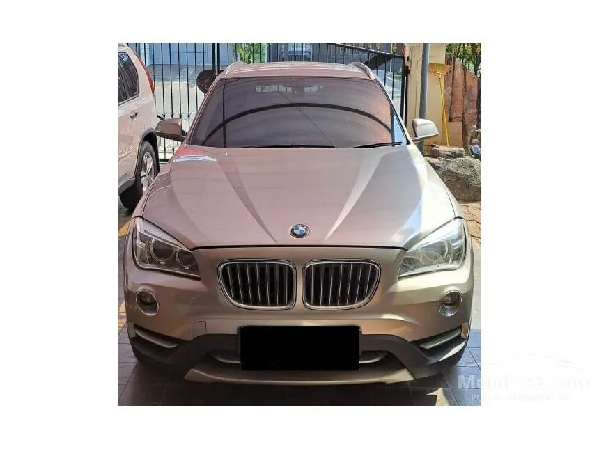 Jual Mobil BMW X1 2013 sDrive18i xLine 2.0 di DKI Jakarta Automatic SUV Coklat Rp 208.000.000