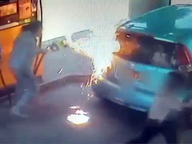 Shocking CCTV Footage Reveals Woman Setting Man's Car On Fire At A Petrol Station