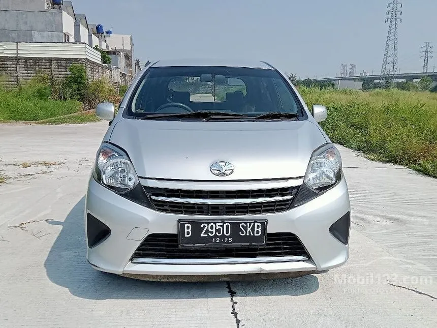 Jual Mobil Toyota Agya 2015 E 1.0 di Jawa Barat Automatic Hatchback Silver Rp 80.000.000