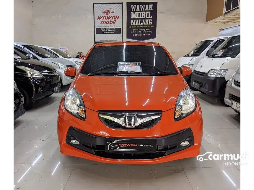 Jual Mobil Honda Brio 2014 E 1.2 di Jawa Timur Automatic Hatchback Orange Rp 117.500.000
