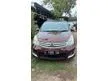 Jual Mobil Nissan Grand Livina 2012 XV 1.5 di Jawa Timur Automatic MPV Merah Rp 108.000.000