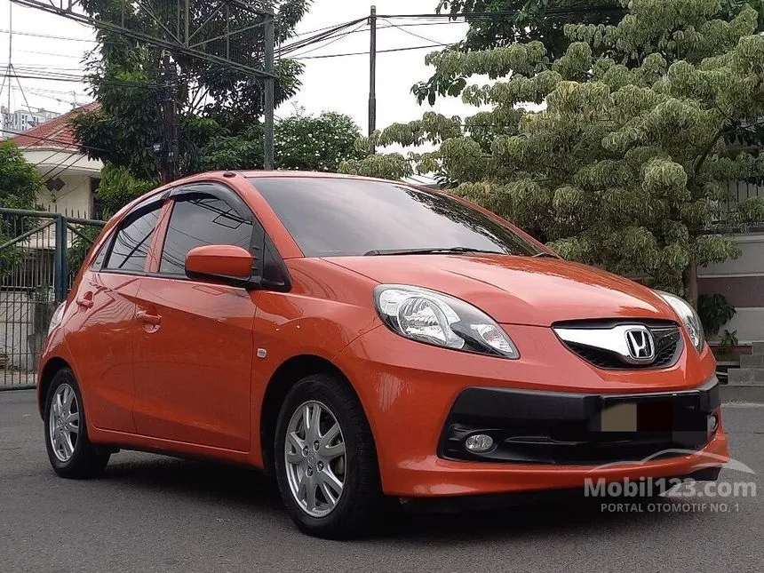 Jual Mobil Honda Brio 2014 E 1.2 di Jawa Timur Automatic Hatchback Orange Rp 108.000.004