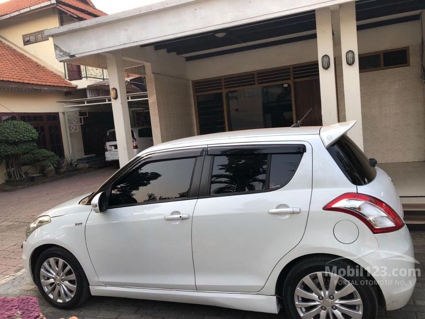 Jual Mobil Suzuki Swift 2015 GX 1.4 di Jawa Timur 