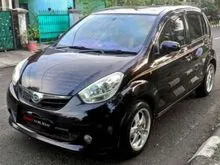 Daihatsu Sirion 1.3 M MT 2014 Ungu TDP 15jt Kondisi Mobil Istimewa Bergaransi dan Dijamin Siap Pakai