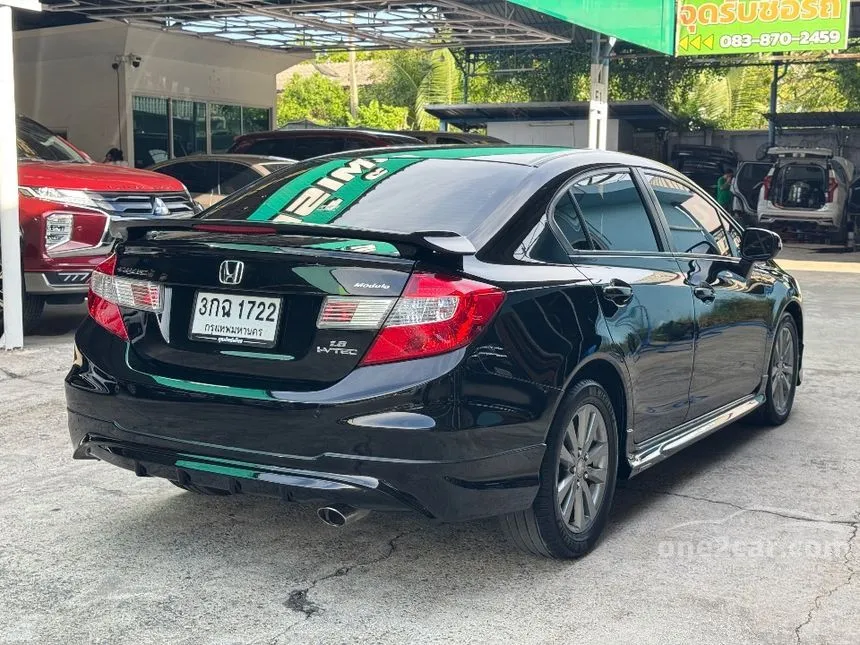 2013 Honda CIVIC E Modulo Sedan