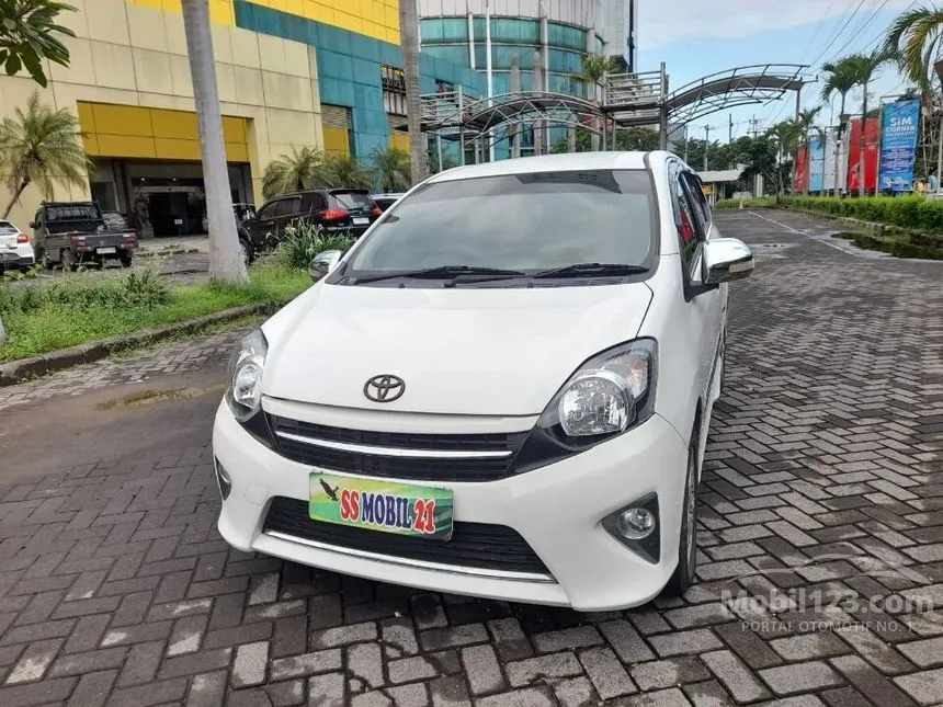 Jual Mobil Toyota Agya 2014 G 1.0 di Jawa Timur Automatic Hatchback Putih Rp 100.000.000