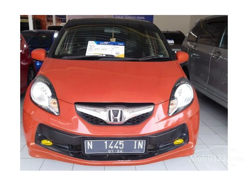 Jual Mobil Honda Brio 2014 E 1.2 di Jawa Timur Automatic Hatchback Orange Rp 125.000.000