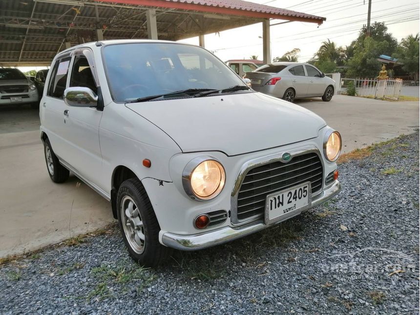 Машина daihatsu mira