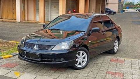 Mitsubishi Lancer Bekas 2010 ini Bisa Bayar DP Pakai Motor