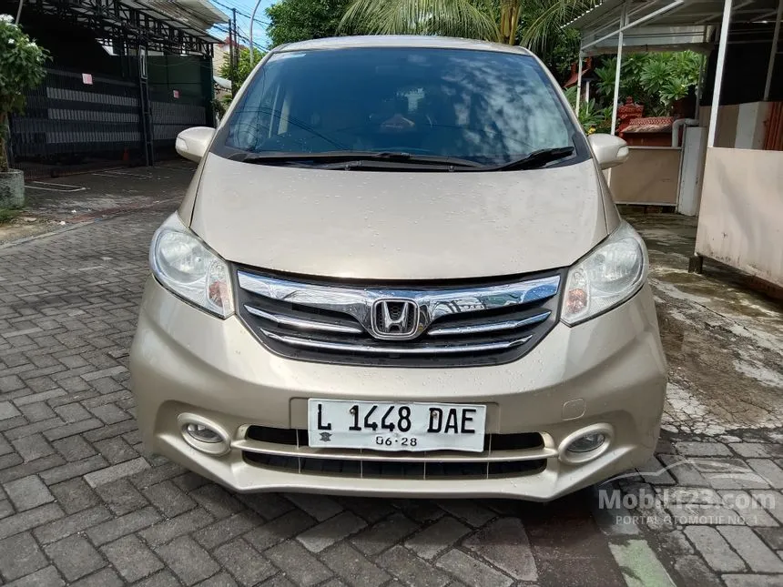 Jual Mobil Honda Freed 2013 E 1.5 di Jawa Timur Automatic MPV Emas Rp 165.000.000