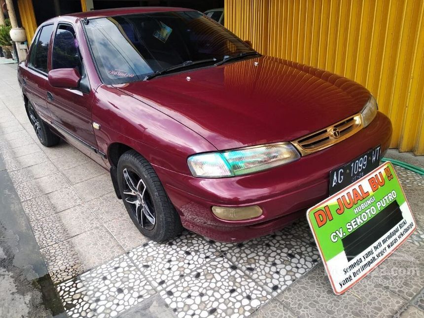 Jual Mobil Timor S-515 2000 SOHC 1.5 di Jawa Timur Manual Sedan Marun ...