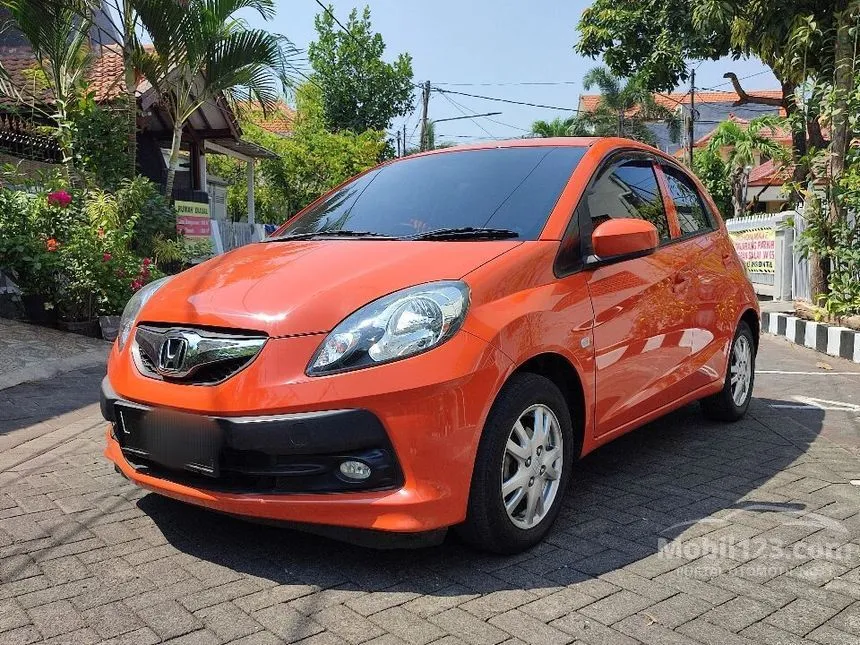 Jual Mobil Honda Brio 2014 Satya E 1.2 di Jawa Timur Manual Hatchback Orange Rp 113.000.006
