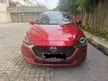 Jual Mobil Mazda 2 2021 GT 1.5 di Jawa Barat Automatic Hatchback Marun Rp 280.000.000